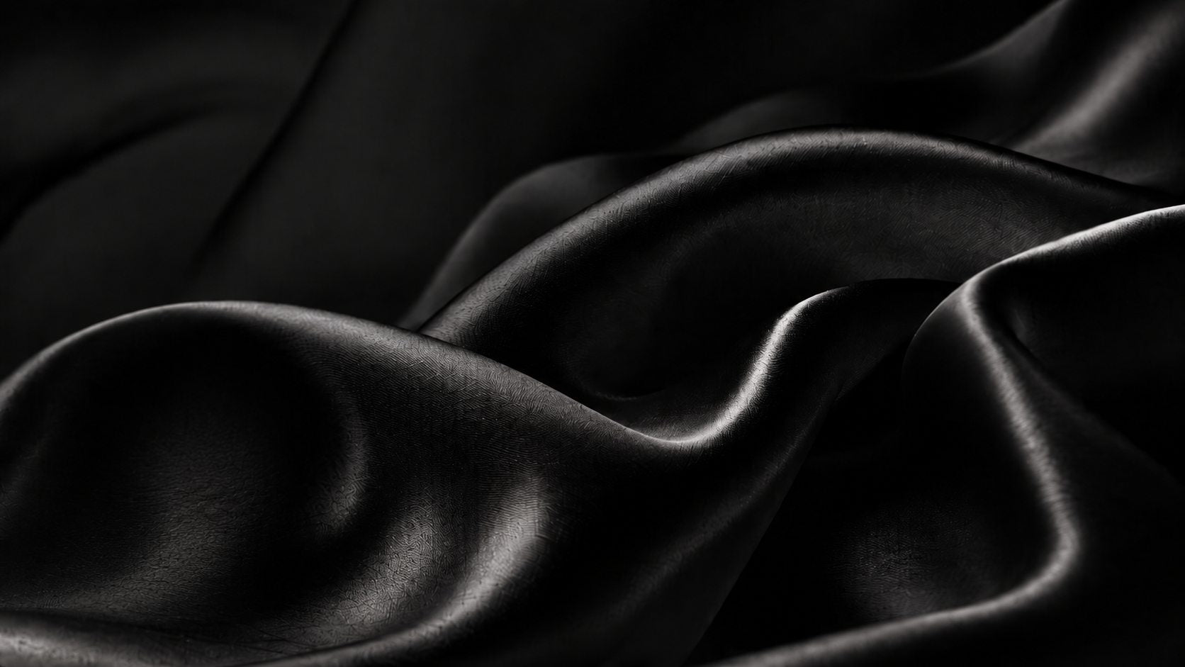 Close-up van de zwarte gladde textiellaag